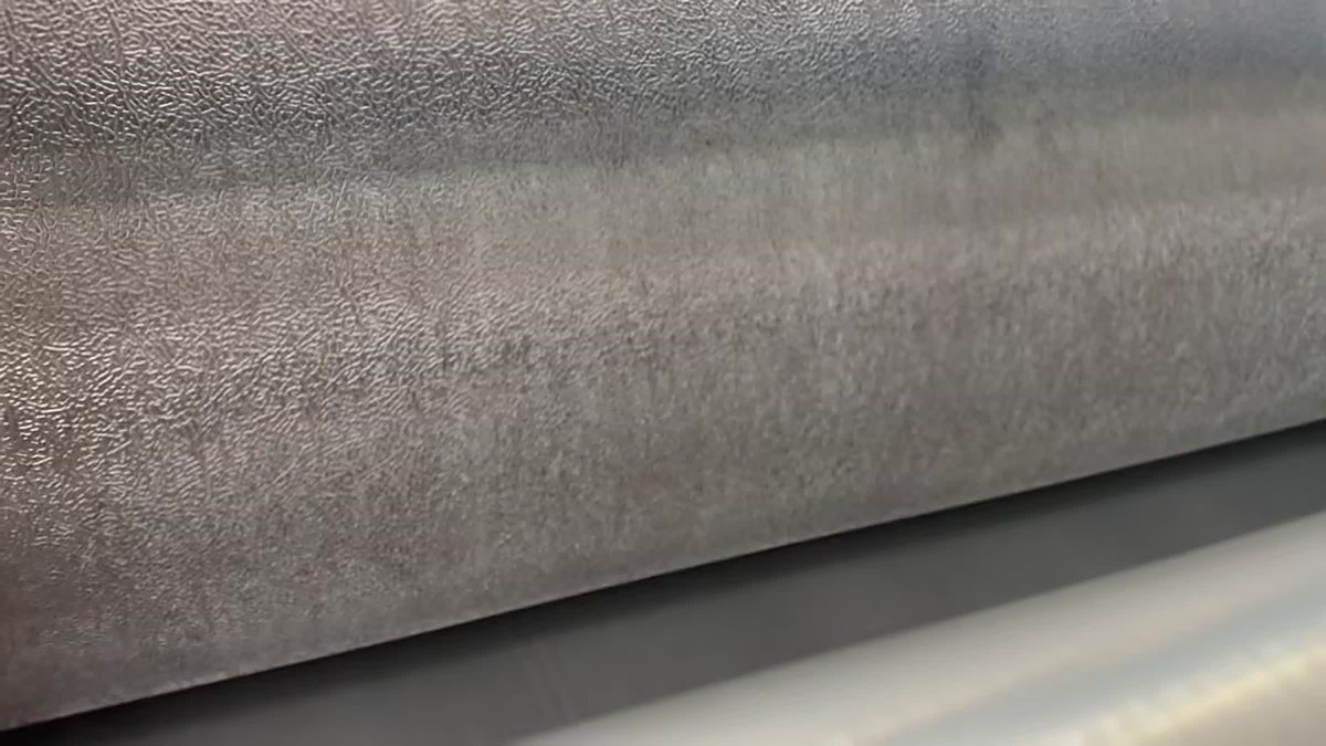 Close-up of an engraved emboss roll