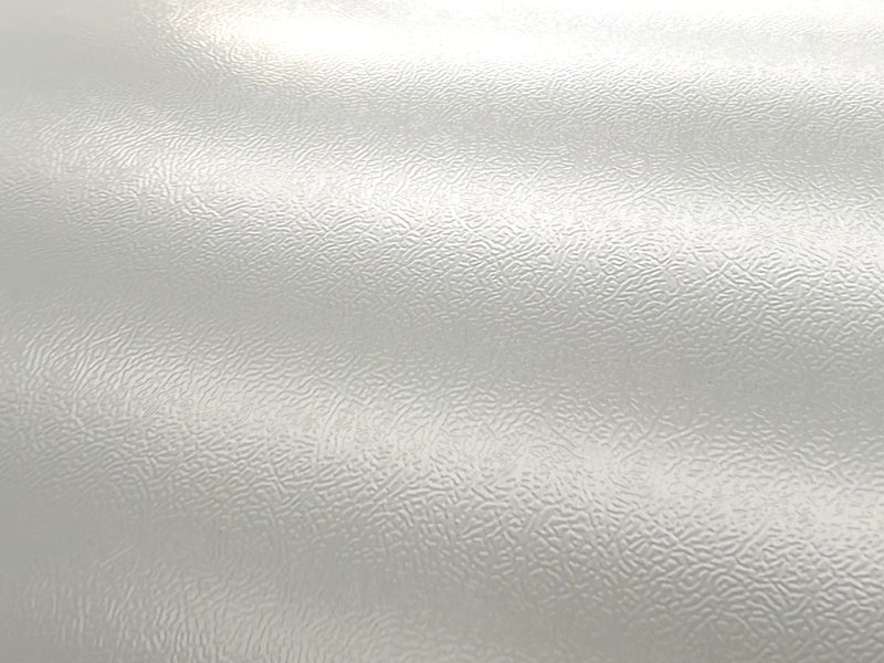 Orange-peel emboss grain close-up